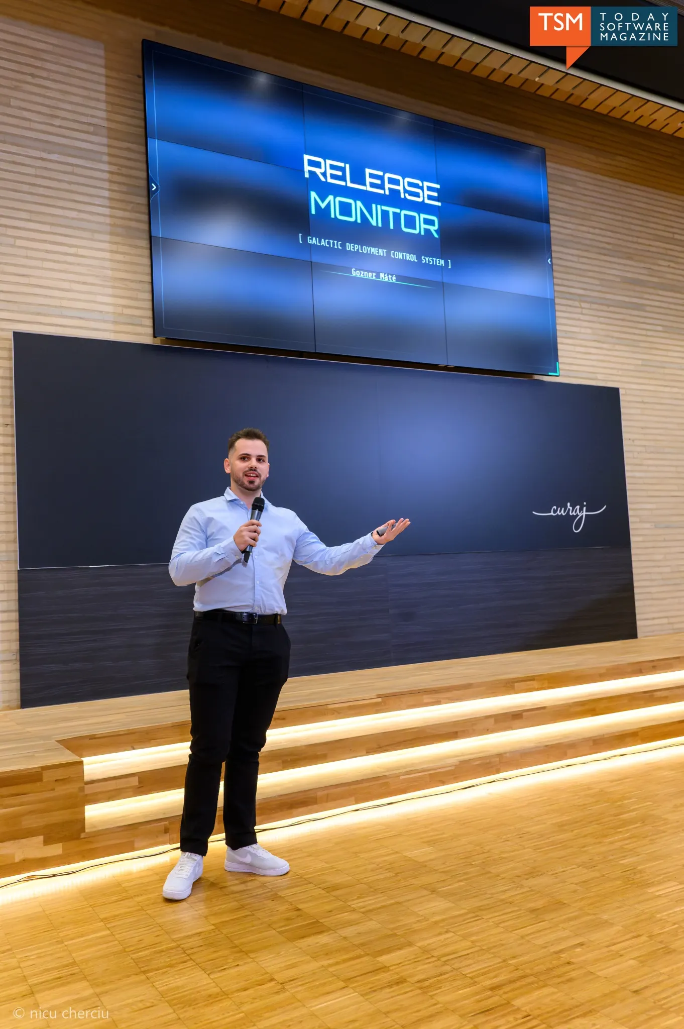 Gozner Mate presenting on stage